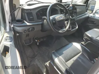 2021 Ford Transit Cargo z VIN 1FTBR1X82MKA08353, wystawiony jako Copart lot #58431105 z przebiegiem 100 195 mil mil oraz Szkoda całkowita • Salvage title. Historia ofert i sprzedaży dostępna na DreamBid. Obrazek 8.