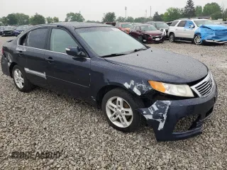 2010 Kia Optima LX z VIN KNAGG4A80A5398981, wystawiony jako Copart lot #59092515 z przebiegiem 153 524 mil mil oraz Szkoda całkowita • Salvage title. Historia ofert i sprzedaży dostępna na DreamBid. Obrazek 4.