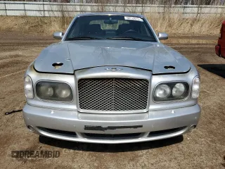2004 Bentley Arnage z VIN SCBLF34F44CX09923, wystawiony jako Copart lot #52712015 z przebiegiem Nie podano mil oraz Tytuł czysty. Historia ofert i sprzedaży dostępna na DreamBid. Obrazek 5.