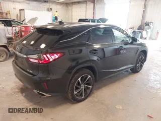 2017 Lexus RX 350 with VIN 2T2BZMCA5HC088079, listed as a IAAI auction lot 42502533 with 128,433 mi miles and . Bid and sale history available at DreamBid. Image 4.