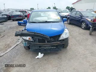 2011 Nissan Versa S with VIN 3N1BC1CP7BL496390, listed as a IAAI auction lot 42324403 with 171,164 mi miles and . Bid and sale history available at DreamBid. Image 13.