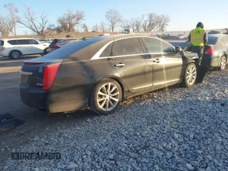 2014 Cadillac XTS Luxury with VIN 2G61M5S32E9289279, listed as a IAAI auction lot 41279495 with 106,655 mi miles. Bid and sale history available at carsss.com. Image 4.