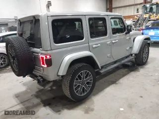 2024 Jeep Wrangler 4xe High Altitude with VIN 1C4RJXU6XRW218114, listed as a IAAI auction lot 41519843 with 17,317 mi miles. Bid and sale history available at carsss.com. Image 4.