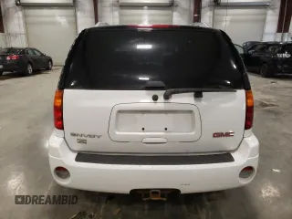2009 GMC Envoy SLT with VIN 1GKDT43S492124405, listed as a Copart auction lot 81337354 with 154,045 mi miles and Salvage Title. Bid and sale history available at carsss.com. Image 6.