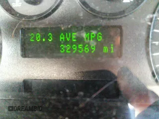 2005 Ford Taurus SE with VIN 1FAFP53U85A129306, listed as a IAAI auction lot 40585457 with 329,569 mi miles. Bid and sale history available at carsss.com. Image 7.