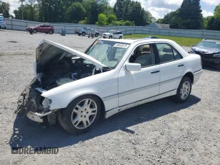 1999 Mercedes-Benz C 230/260/280/320 z VIN WDBHA24G3XA786656, wystawiony jako Copart lot #56043675 z przebiegiem Nie podano mil oraz Szkoda całkowita • Salvage title. Historia ofert i sprzedaży dostępna na DreamBid. Obrazek 1.