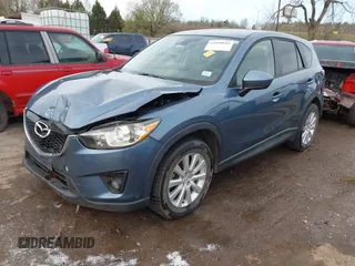 2014 Mazda CX-5 Grand Touring with VIN JM3KE4DYXE0403192, listed as a IAAI auction lot 41828016 with 156,270 mi miles and . Bid and sale history available at carsss.com. Image 17.