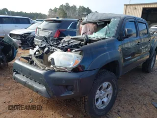 2015 Toyota Tacoma with VIN 3TMLU4EN8FM195249, listed as a IAAI auction lot 41416129 with 129,544 mi miles. Bid and sale history available at carsss.com. Image 2.