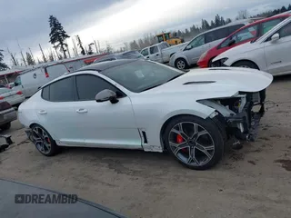 2021 Kia Stinger GT2 with VIN KNAE55LC5M6097982, listed as a IAAI auction lot 41568157 with 57,836 mi miles. Bid and sale history available at carsss.com. Image 14.