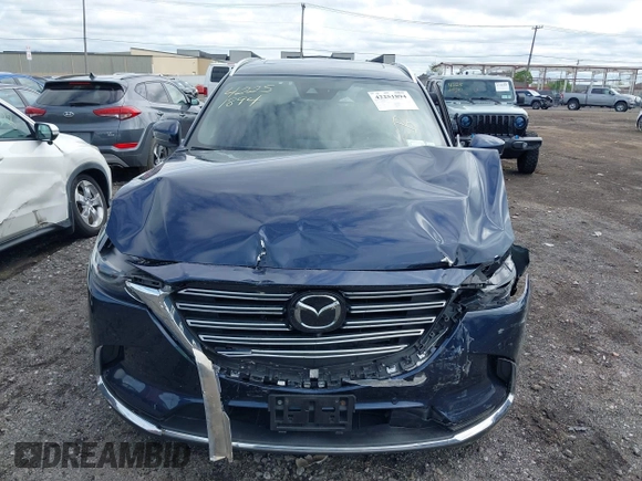 2021 Mazda CX-9 Grand Touring with VIN JM3TCBDY3M0537975, listed as a IAAI auction lot 42251894 with 50,156 mi miles and . Bid and sale history available at DreamBid. Image 12.