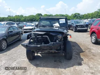 2008 Jeep Wrangler Unlimited Sahara with VIN 1J4GA59128L608515, listed as a IAAI auction lot 42627584 with 157,821 mi miles and . Bid and sale history available at DreamBid. Image 12.