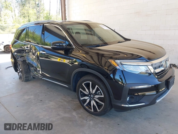 2021 Honda Pilot Touring 8-Passenger z VIN 5FNYF6H99MB049728, wystawiony jako IAAI lot #42194602 z przebiegiem 41 374 mil mil oraz . Historia ofert i sprzedaży dostępna na DreamBid. Obrazek 1.