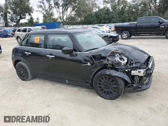 2021 MINI Hardtop 4 Door Oxford Edition with VIN WMWXU7C08M2N64039, listed as a Copart auction lot 83329254 with 31,549 mi miles and Non repairable. Bid and sale history available at DreamBid. Image 4.