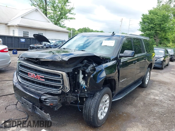2019 GMC Yukon XL SLT z VIN 1GKS2GKC0KR394301, wystawiony jako IAAI lot #42255631 z przebiegiem 149 222 mil mil oraz . Historia ofert i sprzedaży dostępna na DreamBid. Obrazek 6.