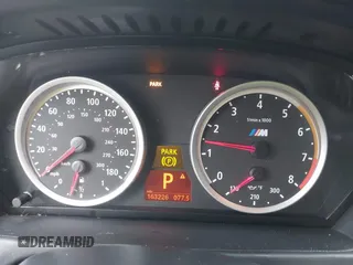 2010 BMW X5 M with VIN 5YMGY0C59ALK25572, listed as a IAAI auction lot 41712140 with 163,226 mi miles. Bid and sale history available at carsss.com. Image 7.