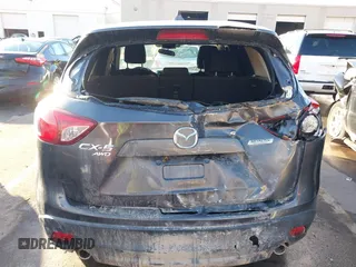 2016 Mazda CX-5 Touring with VIN JM3KE4CY0G0751040, listed as a IAAI auction lot 41290780 with 136,689 mi miles. Bid and sale history available at carsss.com. Image 17.