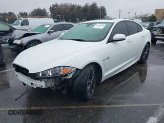 2015 Jaguar XF V6 Portfolio with VIN SAJWA0F70F8U62534, listed as a IAAI auction lot 41521097 with 112,117 mi miles. Bid and sale history available at carsss.com. Image 2.