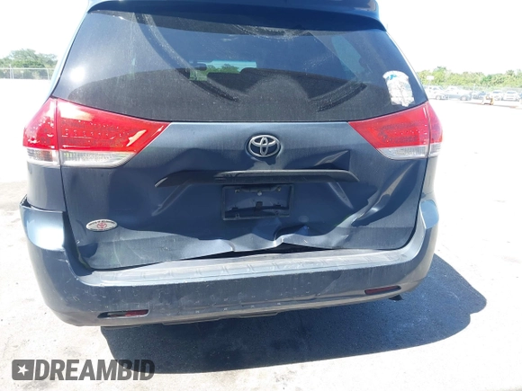 2014 Toyota Sienna L with VIN 5TDZK3DC2ES493997, listed as a IAAI auction lot 41996586 with 192,297 mi miles. Bid and sale history available at carsss.com. Image 6.