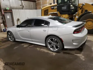 2021 Dodge Charger R/T with VIN 2C3CDXCT5MH522015, listed as a Copart auction lot 61149265 with 77,323 mi miles and Salvage title. Bid and sale history available at DreamBid. Image 2.
