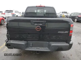 2022 Nissan Frontier Pro-4X z VIN 1N6ED1EK4NN686366, wystawiony jako Copart lot #57396085 z przebiegiem 50 753 mil mil oraz Szkoda całkowita • Salvage title. Historia ofert i sprzedaży dostępna na DreamBid. Obrazek 6.