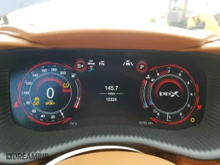 2021 Aston Martin DBX with VIN SCFVUJAW7MTV03341, listed as a Copart auction lot 71015804 with 12,324 mi miles and Salvage Title. Bid and sale history available at carsss.com. Image 9.