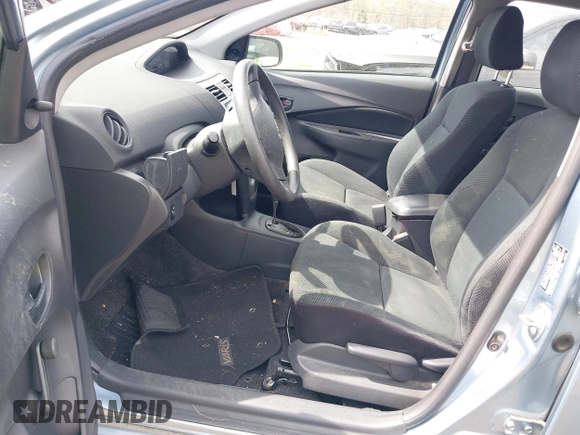 2009 Toyota Yaris with VIN JTDBT903891336792, listed as a IAAI auction lot 42096543 with 115,735 mi miles and . Bid and sale history available at DreamBid. Image 5.