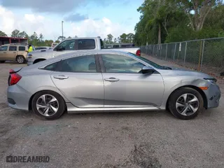 2019 Honda Civic Sedan LX with VIN 2HGFC2F62KH583213, listed as a IAAI auction lot 41935570 with 143,992 mi miles. Bid and sale history available at carsss.com. Image 14.