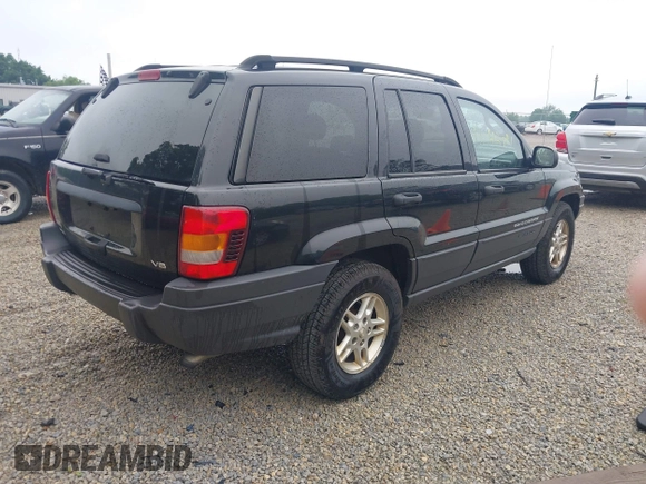 2003 Jeep Grand Cherokee Laredo with VIN 1J4GW48NX3C532874, listed as a IAAI auction lot 42613091 with 165,920 mi miles and . Bid and sale history available at DreamBid. Image 4.