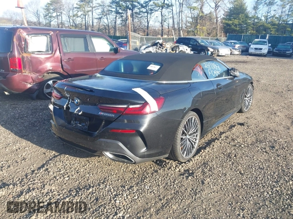 2022 BMW 8 Series with VIN WBAFY4C02NCJ40821, listed as a IAAI auction lot 42026132 with Not provided miles and . Bid and sale history available at DreamBid. Image 4.