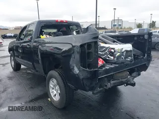 2017 Chevrolet Silverado 1500 LT with VIN 1GCRCREC5HZ113150, listed as a IAAI auction lot 41826582 with 50,565 mi miles and . Bid and sale history available at DreamBid. Image 3.