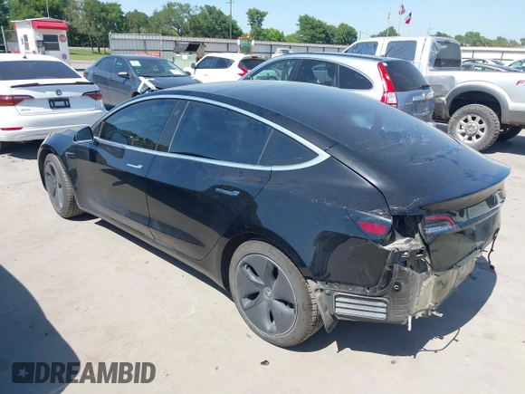 2018 Tesla Model 3 Long Range Battery with VIN 5YJ3E1EA7JF098632, listed as a IAAI auction lot 42002181 with 73,371 mi miles and . Bid and sale history available at DreamBid. Image 3.