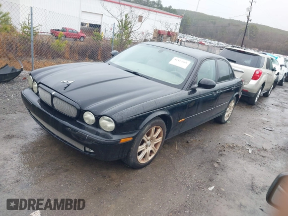 2004 Jaguar XJ with VIN SAJEA71C34SG10171, listed as a IAAI auction lot 41412081 with 150,488 mi miles. Bid and sale history available at carsss.com. Image 2.