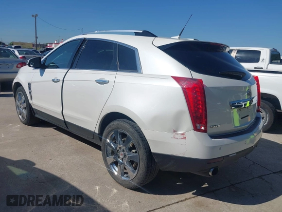 2011 Cadillac SRX Premium Collection z VIN 3GYFNCEYXBS579760, wystawiony jako IAAI lot #42238707 z przebiegiem Nie podano mil oraz . Historia ofert i sprzedaży dostępna na DreamBid. Obrazek 3.