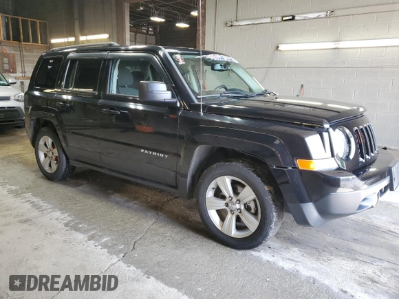 2014 Jeep Patriot Latitude with VIN 1C4NJPFB0ED890696, listed as a Copart auction lot 55581825 with 70,030 mi miles and Salvage title. Bid and sale history available at DreamBid. Image 4.