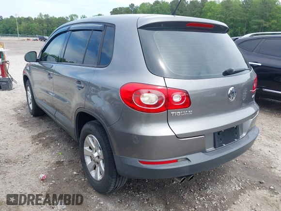 2010 Volkswagen Tiguan with VIN WVGCV7AX9AW515432, listed as a IAAI auction lot 42105962 with 91,405 mi miles and . Bid and sale history available at DreamBid. Image 3.
