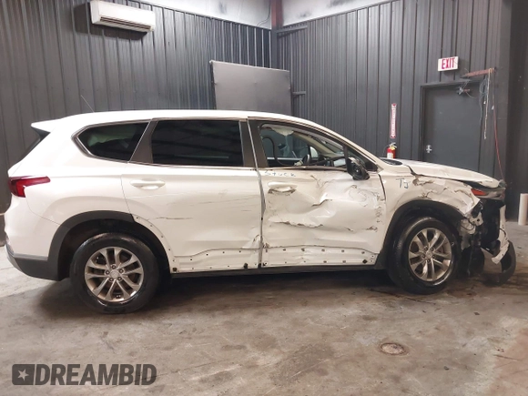2020 Hyundai Santa Fe SE with VIN 5NMS2CAD8LH163523, listed as a IAAI auction lot 42123756 with 72,992 mi miles and . Bid and sale history available at DreamBid. Image 14.