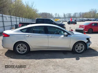 2018 Ford Fusion SE z VIN 3FA6P0H77JR226390, wystawiony jako IAAI lot #42120981 z przebiegiem 114 057 mil mil oraz . Historia ofert i sprzedaży dostępna na DreamBid. Obrazek 14.