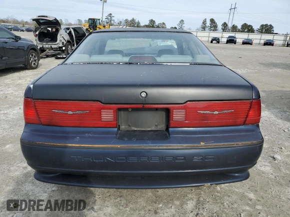 1991 Ford Thunderbird with VIN 1FAPP64R3MH164460, listed as a Copart auction lot 43114305 with 86,771 mi miles and Salvage Title. Bid and sale history available at DreamBid. Image 6.