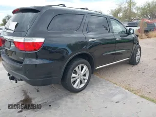 2013 Dodge Durango Crew with VIN 1C4RDHDG1DC647447, listed as a IAAI auction lot 42237714 with 177,523 mi miles and . Bid and sale history available at DreamBid. Image 4.