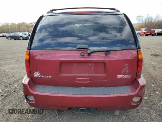 2007 GMC Envoy Denali with VIN 1GKET63M472231291, listed as a Copart auction lot 77020984 with 157,364 mi miles and Salvage Title. Bid and sale history available at DreamBid. Image 6.