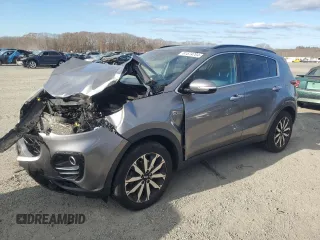 2018 Kia Sportage EX z VIN KNDPNCAC1J7308457, wystawiony jako Copart lot #81574704 z przebiegiem Nie podano mil oraz Szkoda całkowita • Salvage title. Historia ofert i sprzedaży dostępna na DreamBid. Obrazek 1.