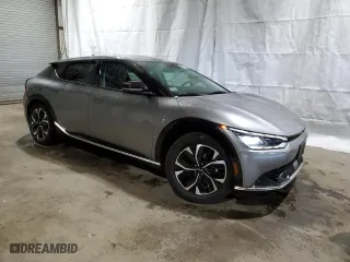 2023 Kia EV6 Wind with VIN KNDC34LA0P5612356, listed as a Copart auction lot 70923244 with 26,167 mi miles and Salvage Title. Bid and sale history available at carsss.com. Image 4.
