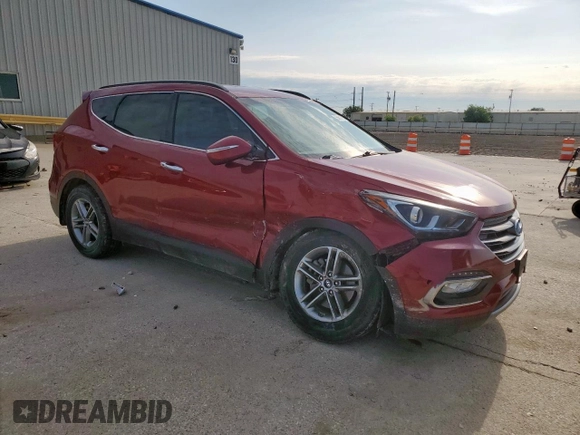 2017 Hyundai Santa Fe 2.4L z VIN 5XYZU3LB5HG473456, wystawiony jako Copart lot #55631615 z przebiegiem 92 374 mil mil oraz Szkoda całkowita • Salvage title. Historia ofert i sprzedaży dostępna na DreamBid. Obrazek 4.