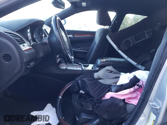 2012 Chrysler 300 with VIN 2C3CCAAG7CH117018, listed as a Copart auction lot 48672635 with 195,880 mi miles and Salvage Title. Bid and sale history available at carsss.com. Image 7.
