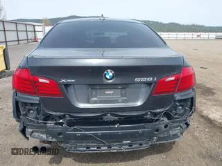2014 BMW 5 Series 528i xDrive with VIN WBA5A7C55ED617099, listed as a IAAI auction lot 42003348 with 85,262 mi miles and . Bid and sale history available at DreamBid. Image 17.