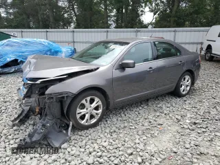 2012 Ford Fusion SE with VIN 3FAHP0HA0CR355529, listed as a Copart auction lot 62585515 with 113,094 mi miles and Salvage title. Bid and sale history available at DreamBid. Image 1.