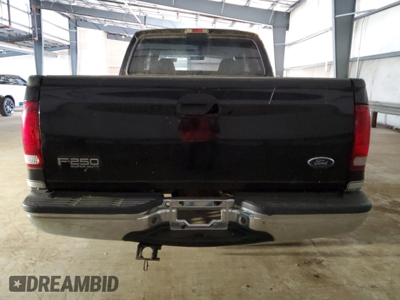 2002 Ford Super Duty F-250 XL with VIN 1FTNW21L02EC99052, listed as a Copart auction lot 76759774 with 84,467 mi miles and Clean Title. Bid and sale history available at carsss.com. Image 6.