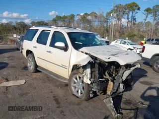 2013 GMC Yukon Denali with VIN 1GKS1EEF6DR278035, listed as a IAAI auction lot 41526763 with 149,815 mi miles. Bid and sale history available at carsss.com. Image 1.