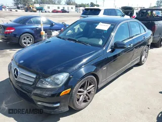 2012 Mercedes-Benz C-Class C 250 Sport with VIN WDDGF4HB4CA644826, listed as a IAAI auction lot 41838602 with 144,769 mi miles. Bid and sale history available at carsss.com. Image 2.