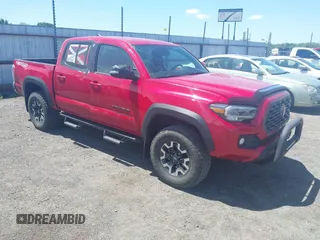 2021 Toyota Tacoma SR z VIN 3TMCZ5AN0MM450583, wystawiony jako IAAI lot #42057340 z przebiegiem 75 131 mil mil oraz . Historia ofert i sprzedaży dostępna na DreamBid. Obrazek 1.